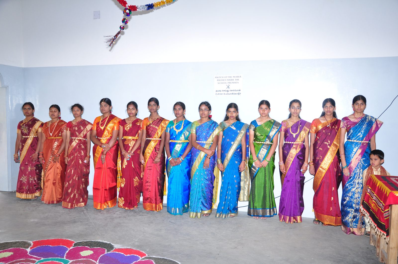 Staff and performers in traditional dress