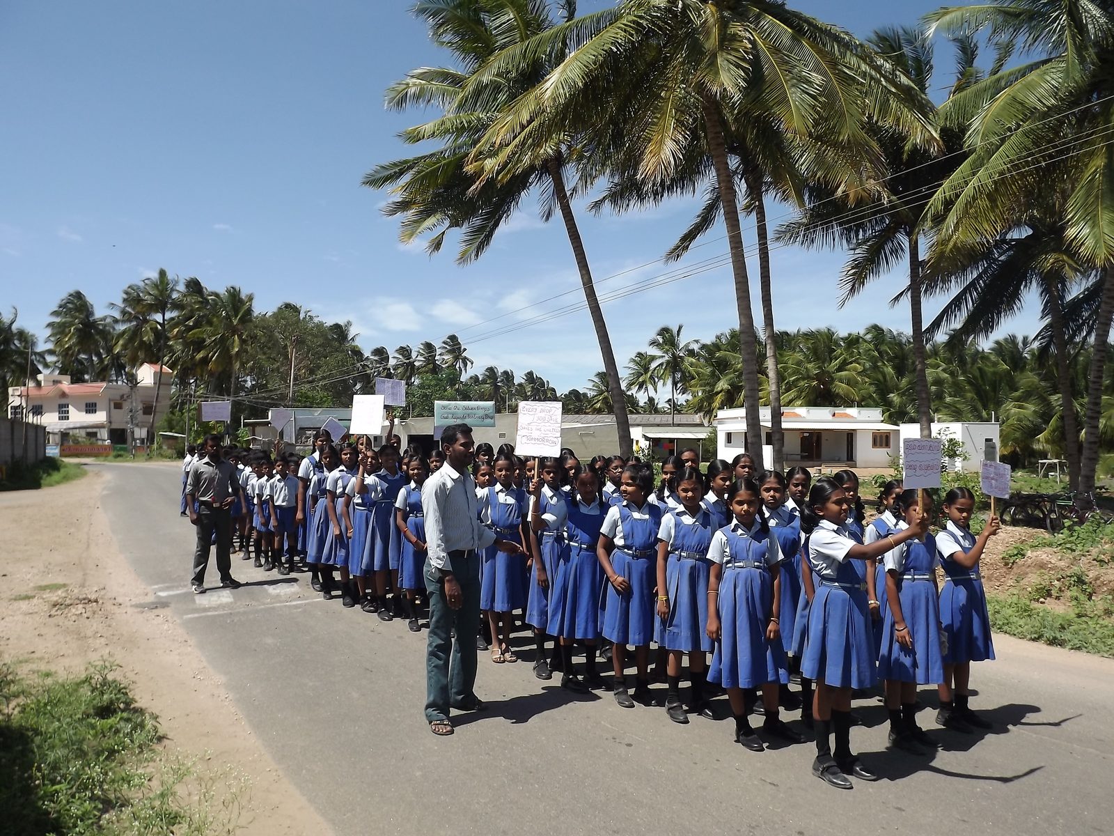 Students procession through the village