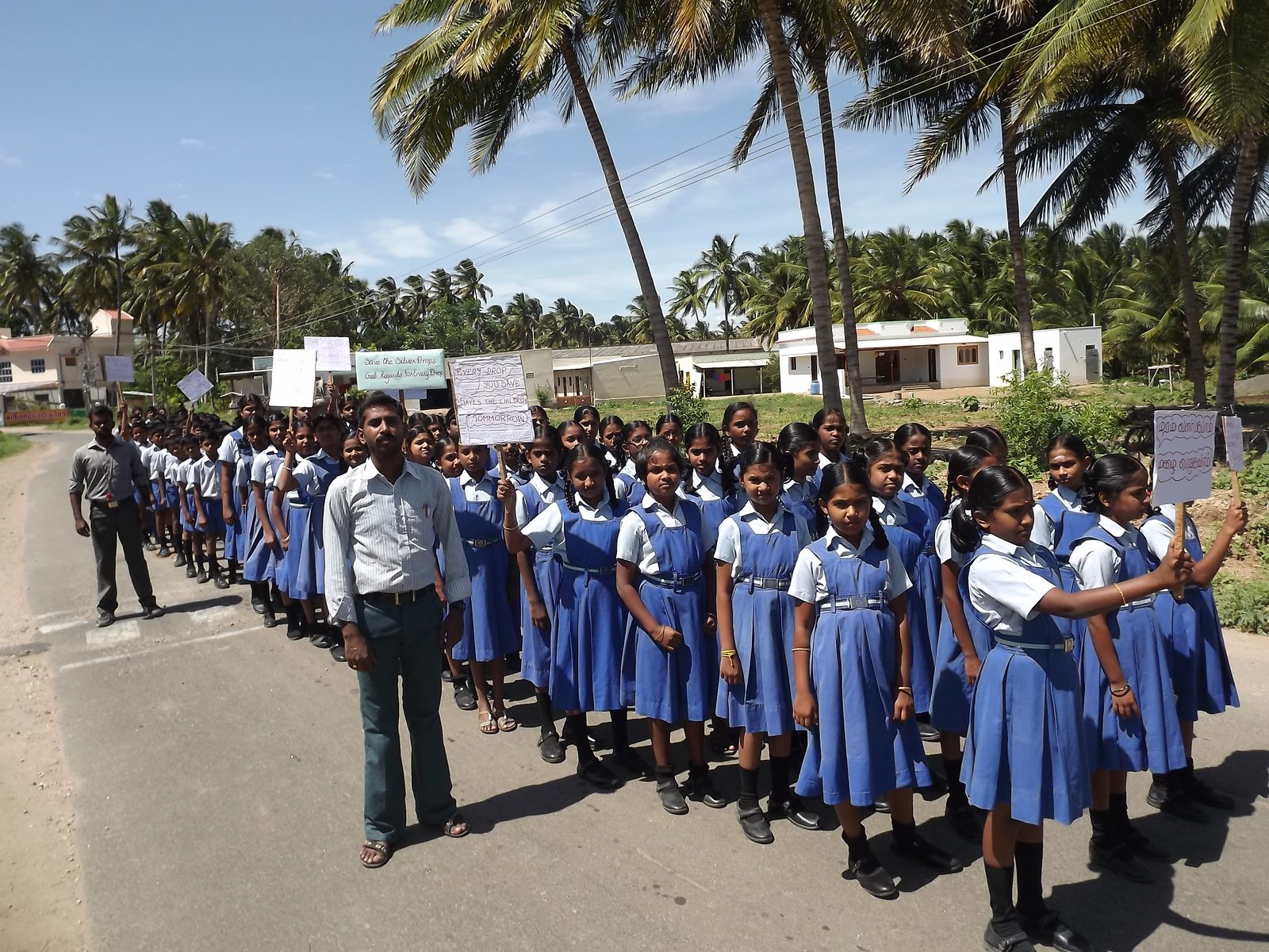 Students in an awareness rally with placards