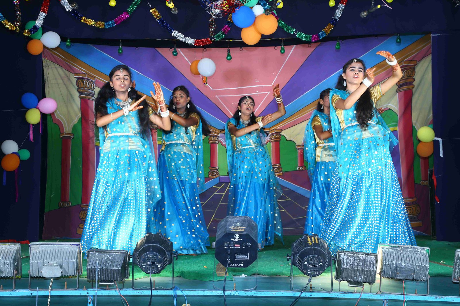 Dance performance in blue costumes